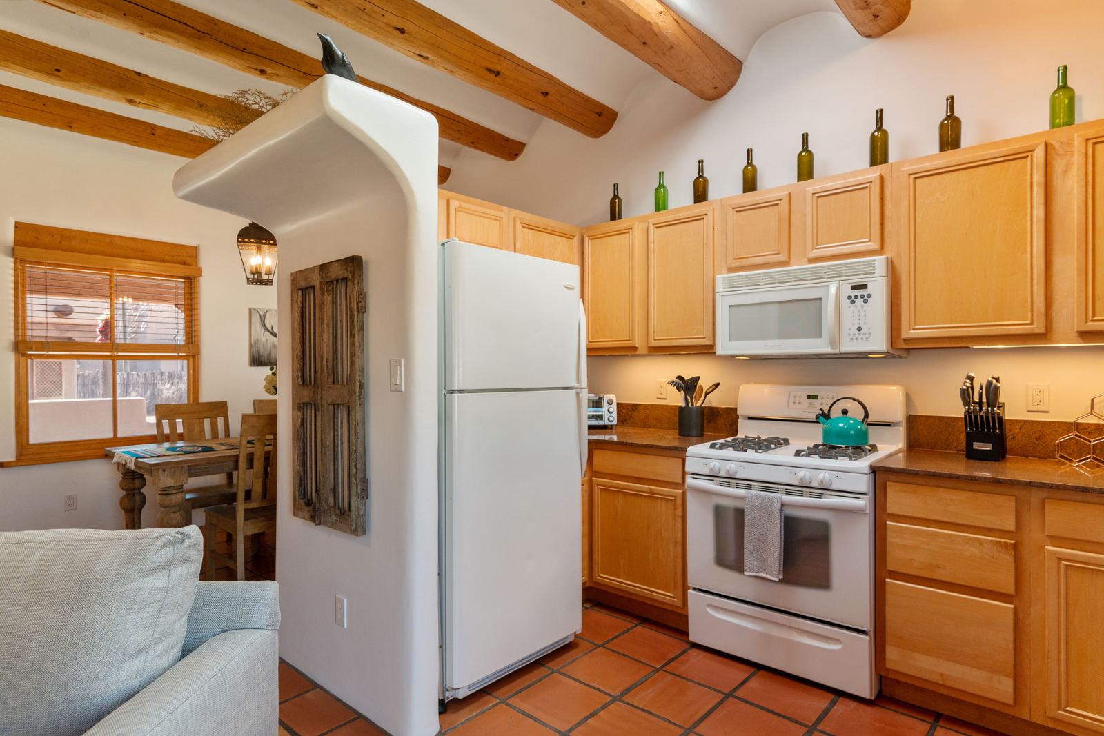 Kitchen with gas range and maple cabinets